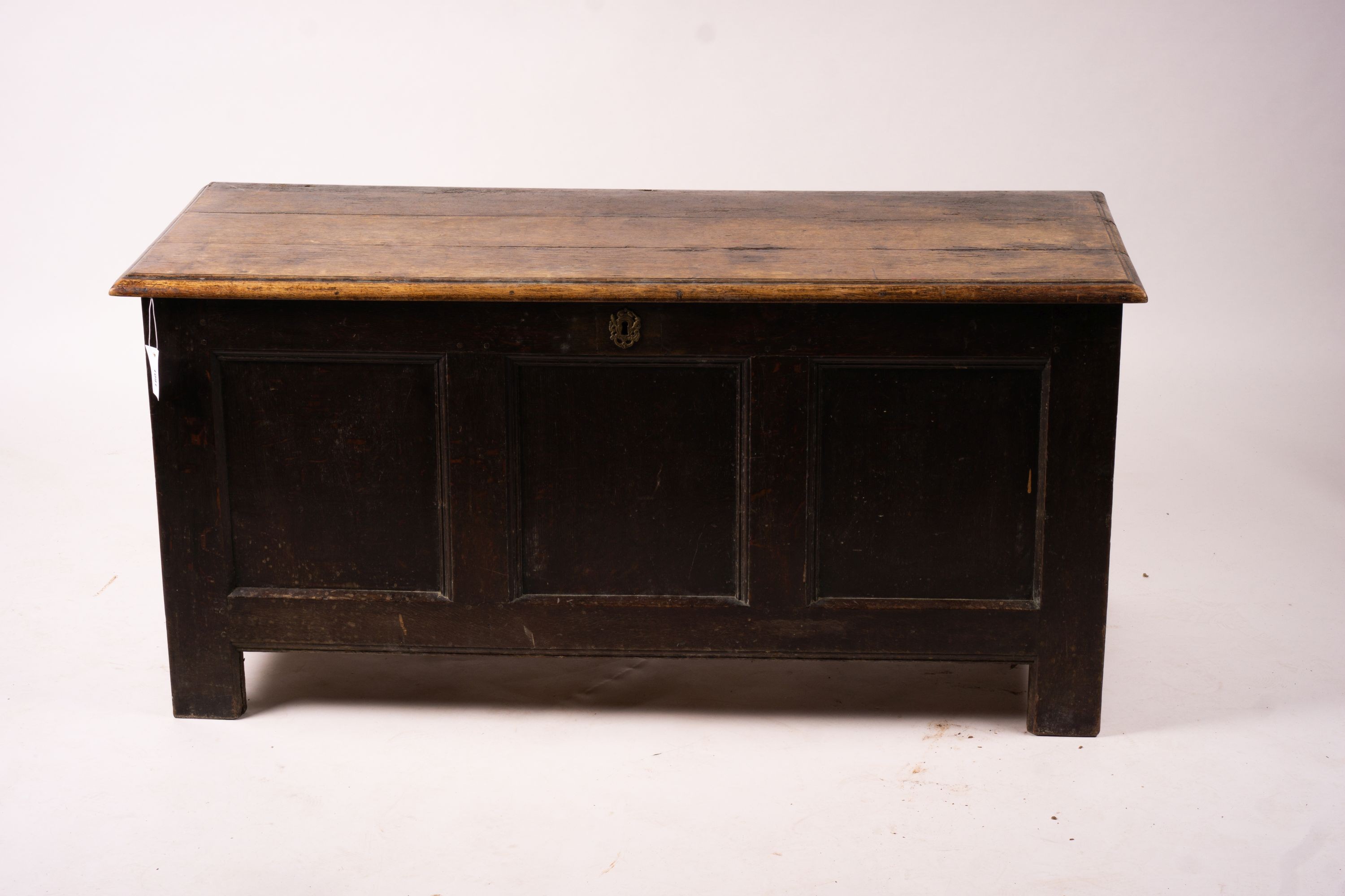 A 17th century panelled oak coffer, length 136cm, depth 56cm, height 64cm